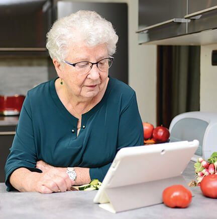 Older woman using a tablet