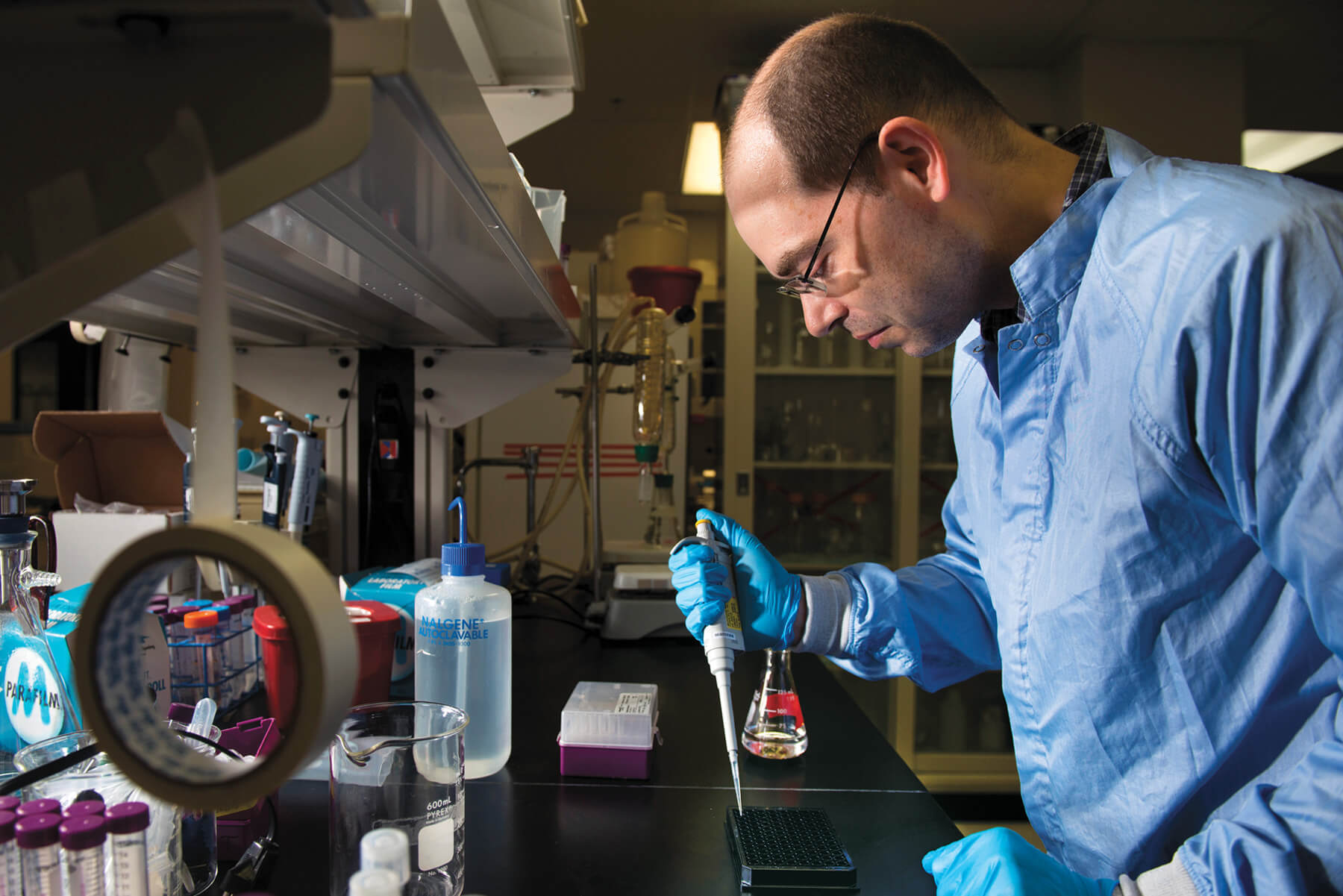 Andrew Doyle working in a lab