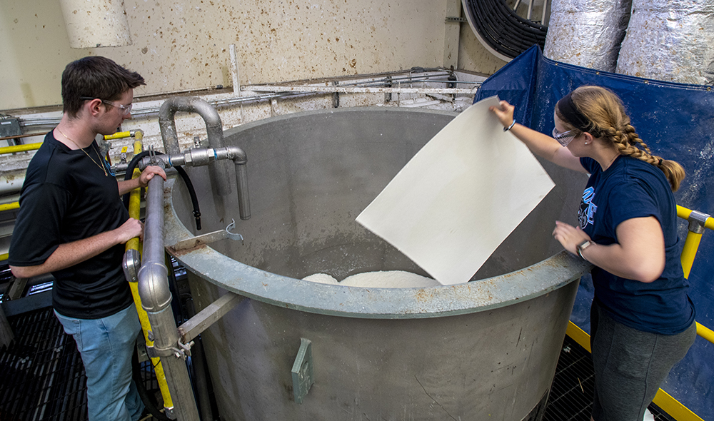 UMaine nanocellulose production in the Process Development Center begins with rehydrating sheets made from wood pulp.