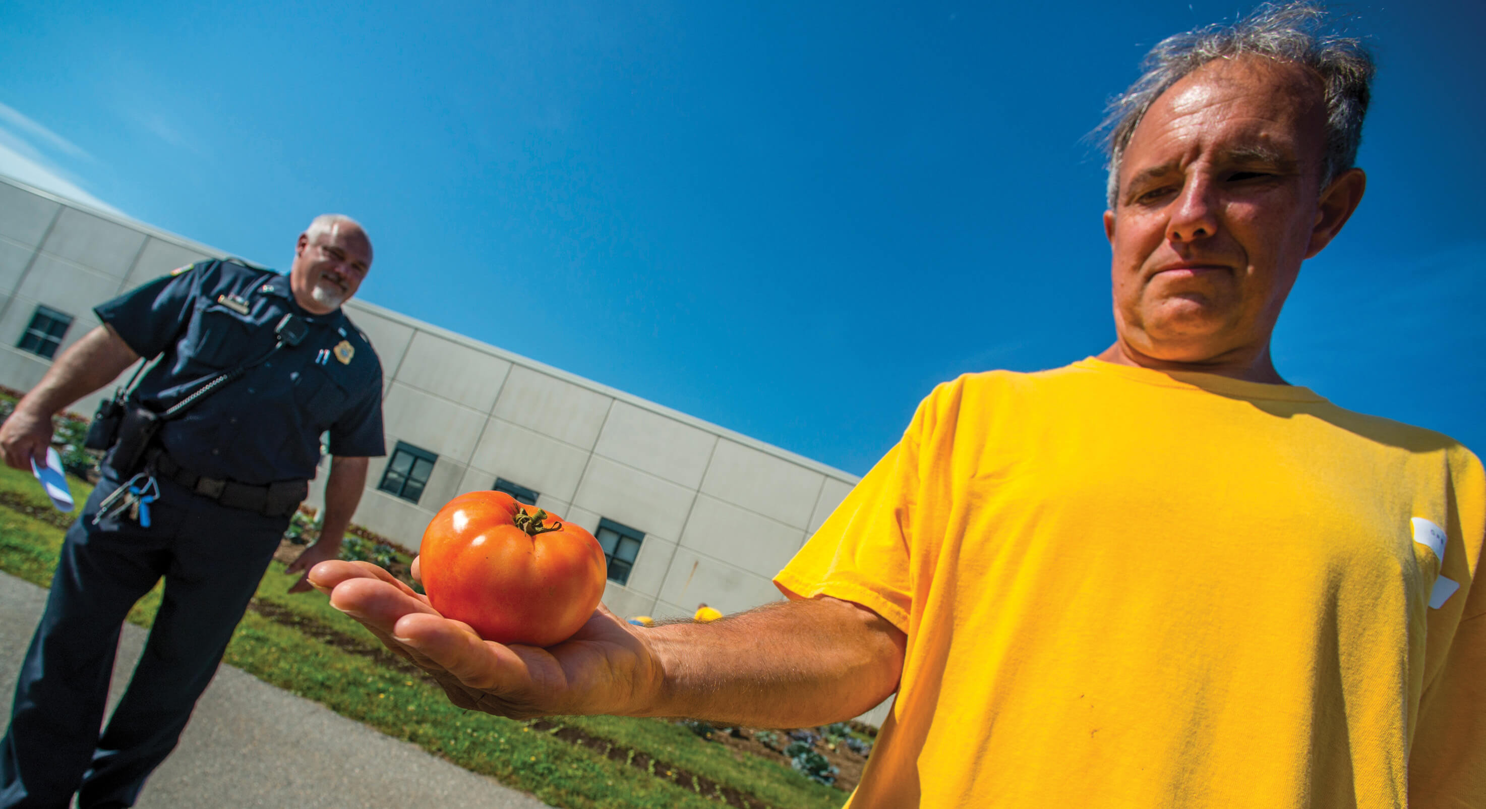 Inmate-with-tomato-Centered-image-1