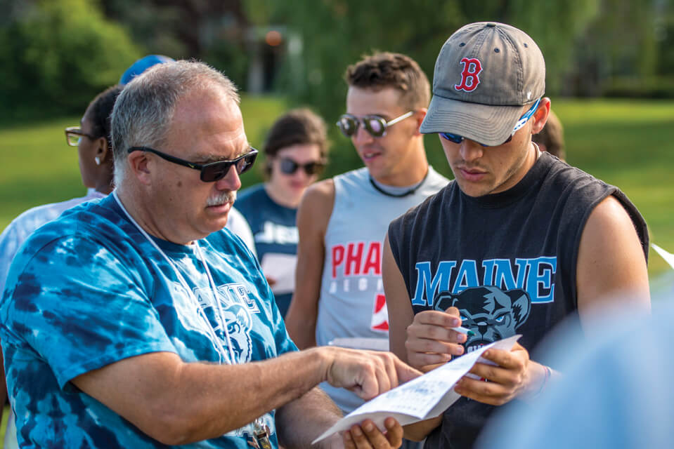 Chris White mentoring a student